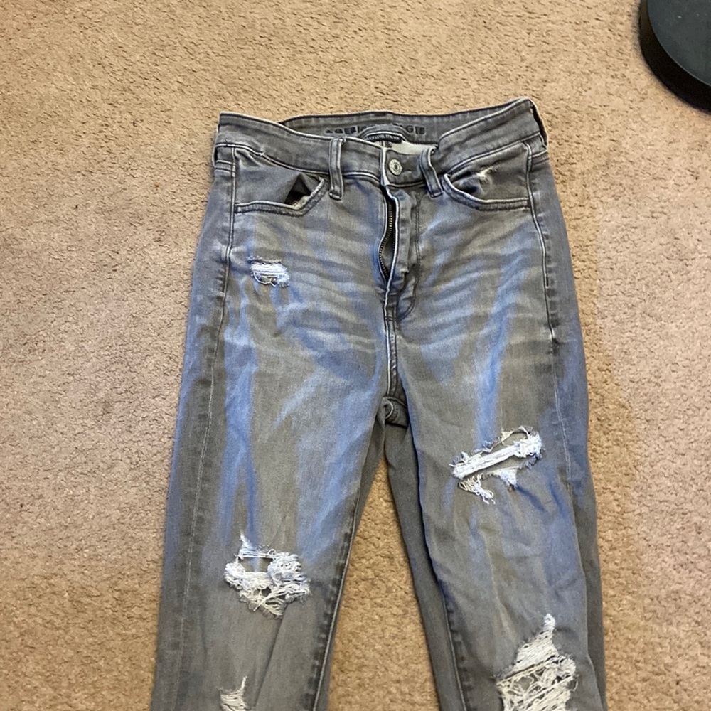 Grey ripped jeans